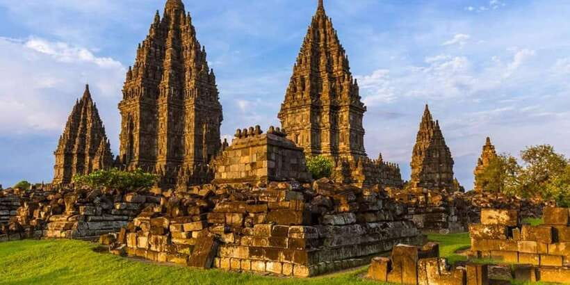 Prambanan Sunset (and Ramayana Ballet Option) Tour - Entering Prambanan with a guide: reliefs, spires, and real context
