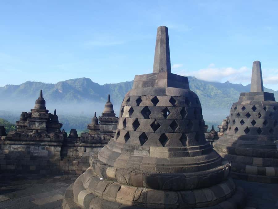 Yogyakarta: Borobudur guarantee climb up & Prambanan Sunset - Climbing Borobudur to the Top: Views, Stupas, and Carved Detail