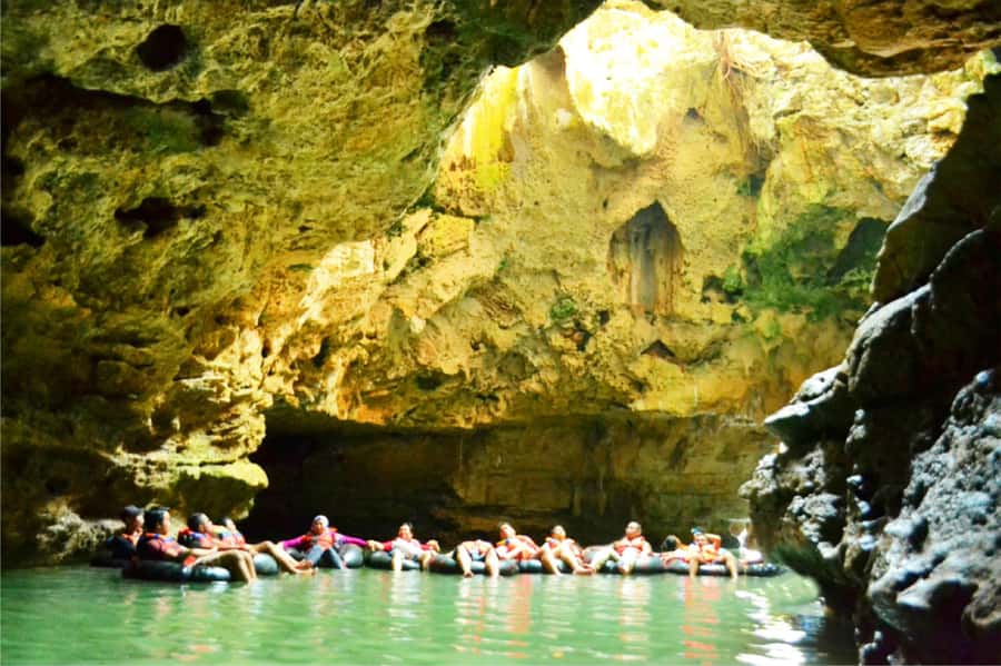 Yogyakarta: Jomblang Cave & Pindul Cave with Donut Boat Ride - Pindul Cave on a donut boat: relaxing tubing with a waterfall payoff